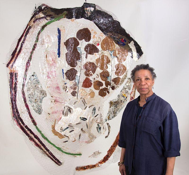 Suzanne Jackson pictured with her "Woodpecker's Last Blues" painting in 2013.