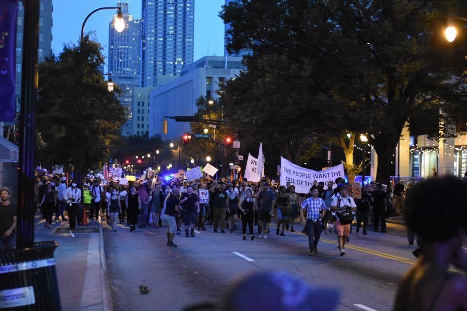 Protesters march down Peachtree Street in Atlanta, on the way to Piedmont Park.
