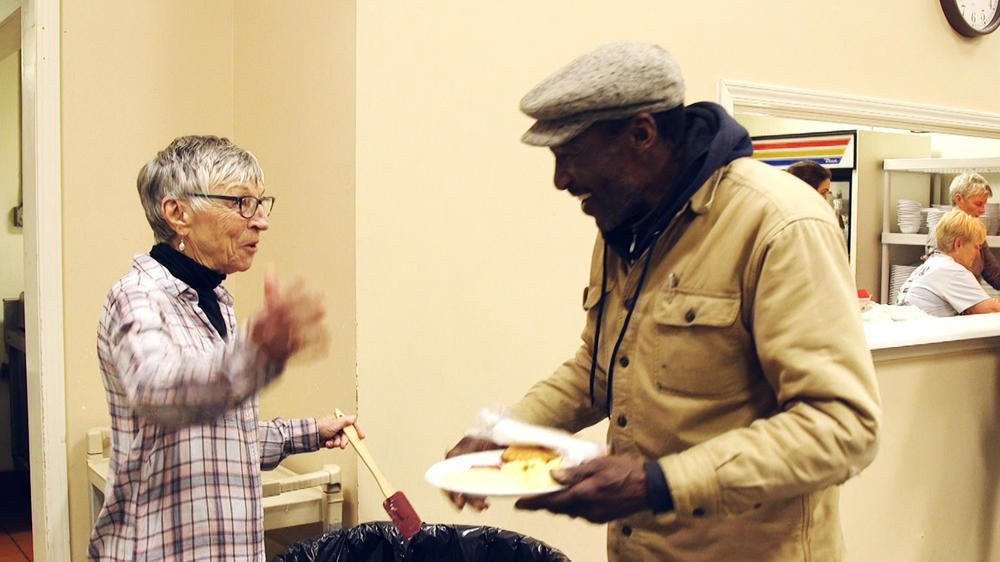 Barb Fischer, left, with a patron of the Sunday brekfast at Centenary United Methodist Church in Macon. 