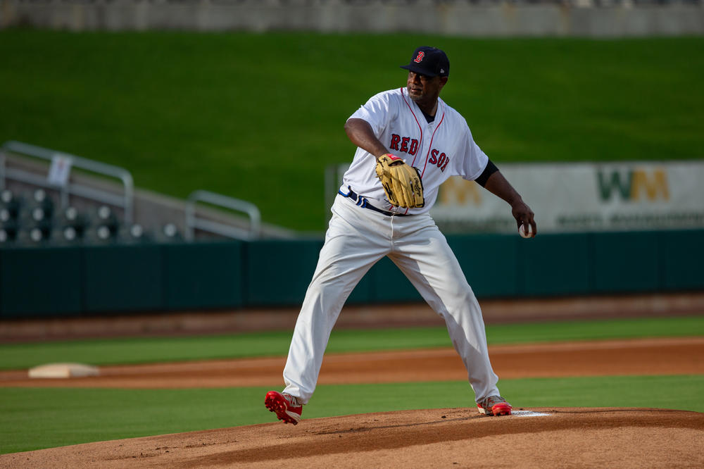 Jimmy Williams, 54, winds up to deliver a pitch during a recent game in Birmingham, Ala. Williams played 18 years in the minor leagues and is happy to be pitching again at a professional ballpark.