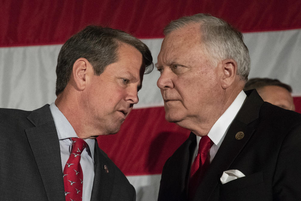 Brian Kemp and Nathan Deal during a campaign rally.
