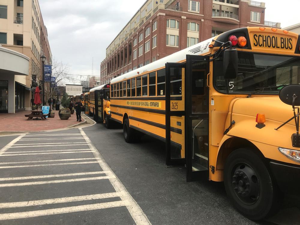 Seventy-two school buses rolled through the streets of Atlanta today to raise awareness about sex trafficking.