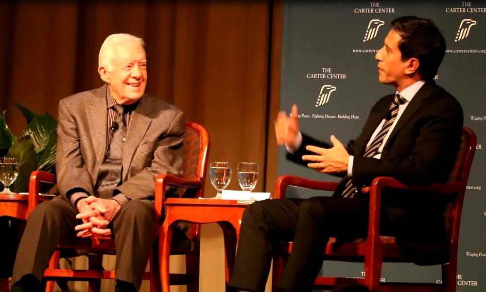 Former U.S. President Jimmy Carter and CNN Chief Medical Correspondent Dr. Sanjay Gupta speaking to an audience at the Carter Center in Atlanta, Wednesday January 11, 2017.