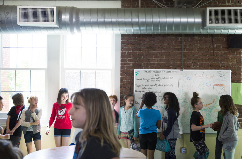 Students line up to leave lunch at the Atlanta Neighborhood Charter School in the Grant Park neighborhood recently.