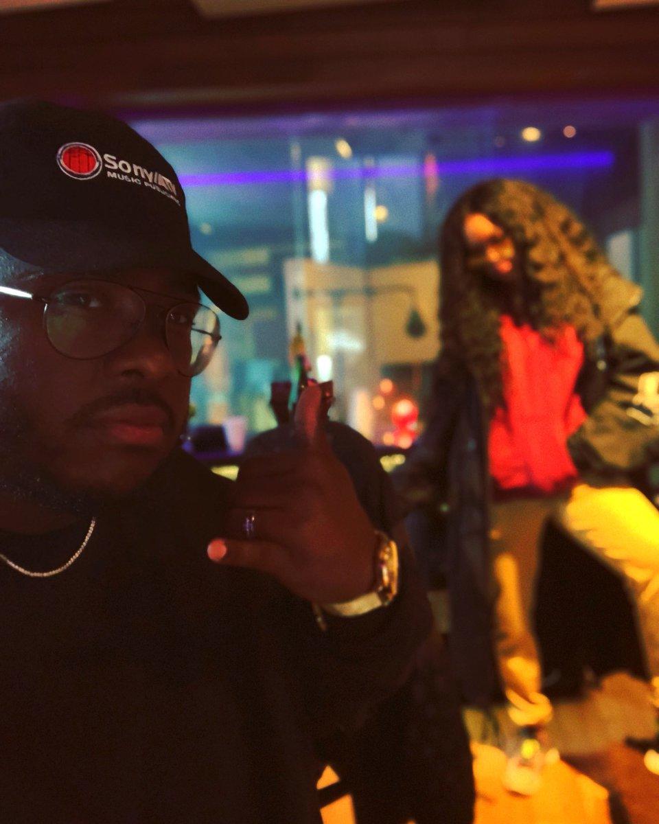 David Harris in studio with H.E.R. in 2018.