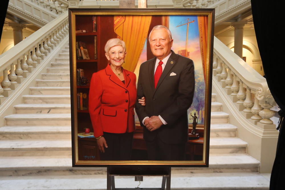 First lady Sandra Deal stands next to Gov. Nathan Deal in his official portrait unveiled Thursday. 