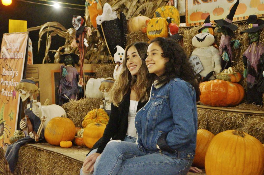 Two people posed for a picture at Randy's Pumpkin Patch.