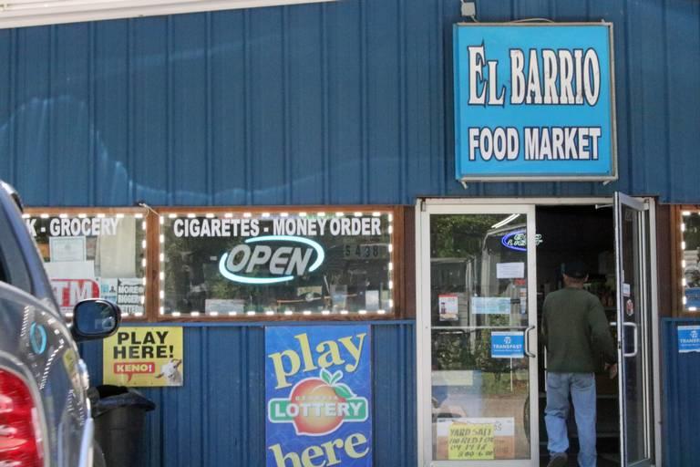 A man walks into El Barrio Food Market on Red Fox Run Road in Warner Robins, a neighborhood that is home to many Latinos, and from which people have been arrested and held for ICE in Houston County jails.