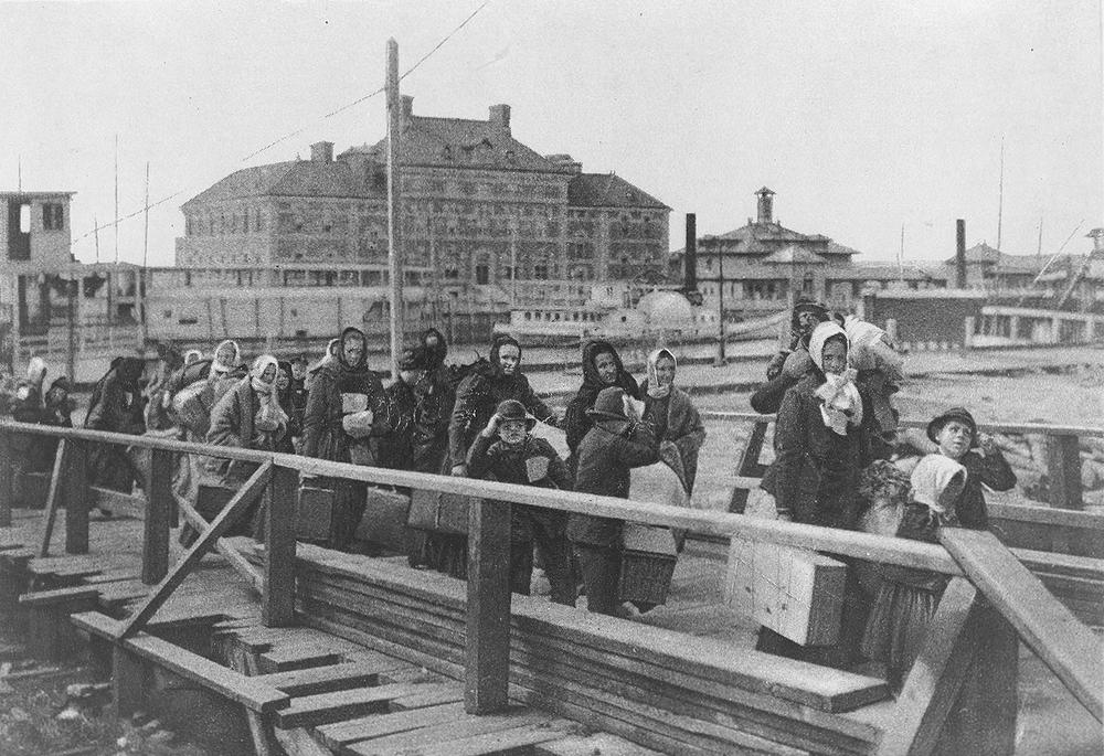 Immigrants arriving at Ellis Island in 1902. 