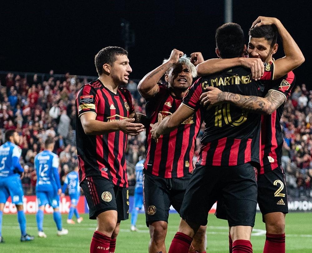 Atlanta United players celebrate a goal en route to a 3-0 over Motagua during the second leg of a Round of 16 matchup in the CONCACAF Champions League on Feb. 25, 2020.