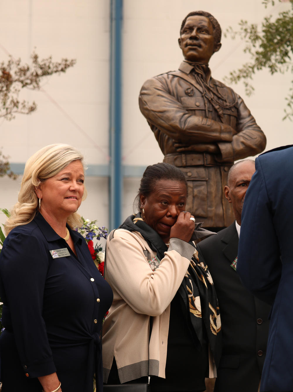 Harriett Bullard-White, one of Eugene Bullard's cousins, stands in front of the statue of Eugene Bullard after it was unveiled at the Air Force Museum of Aviation on the Robins Air Force Base in Warner Robins, Georgia on Wednesday, Oct. 9, 2019. Bullard fought in the French Armed Forces in World War I and was the first African American fighter pilot