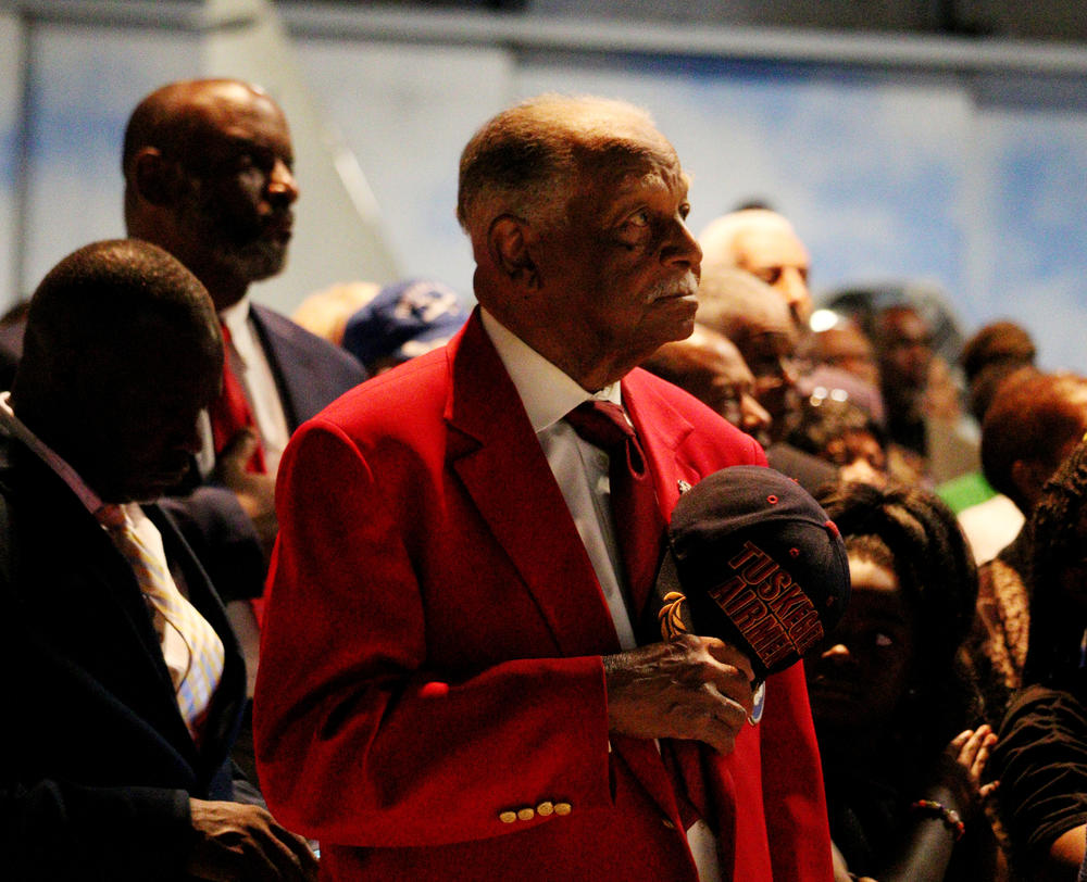 A Tuskegee Airman holds his hat over his heart at the memorial dedication ceremony for the statue of Eugene J. Bullard in Warner Robins, Georgia on Wednesday, 0ct. 9, 2019. Bullard fought on the French Armed Forces during World War I and is the first African American fighter pilot.