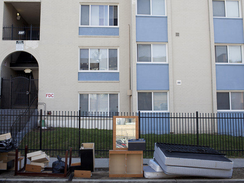 Personal belongings and furniture piled up outside Limes' apartment complex during one of two evictions that took place on March 3, 2016