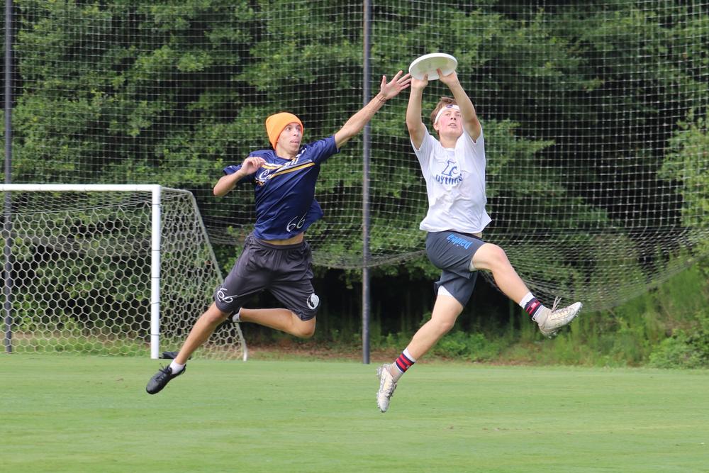 Jack Krugler (#23) jumps to catch the disc.