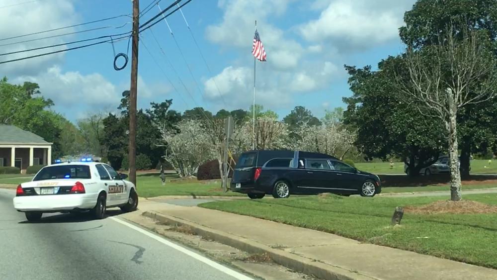 Motorcade pulls into Macon Memorial Park for Bibb-County Deputies Private Funeral 