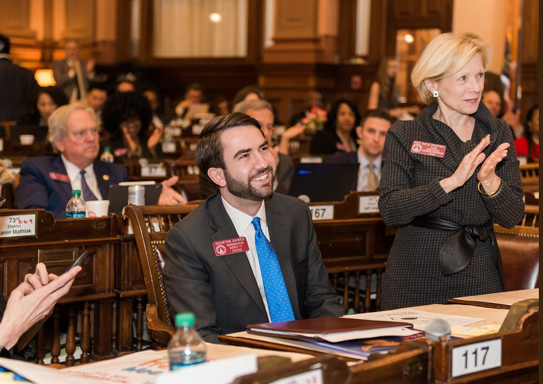 Rep. Houston Gaines and Rep. Katie Dempsey celebrate the passing of HB 217 on Feb. 25.