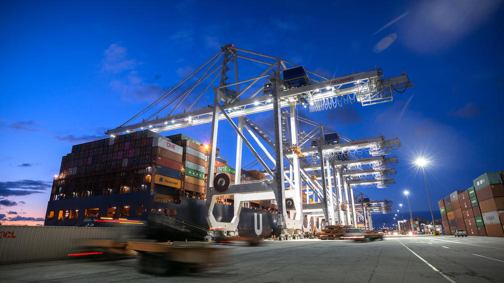 A Hapag Lloyd vessel with a capacity of 13,300 twenty-foot equivalent container units is worked at the Georgia Ports Authority Garden City Terminal in Savannah, Ga.