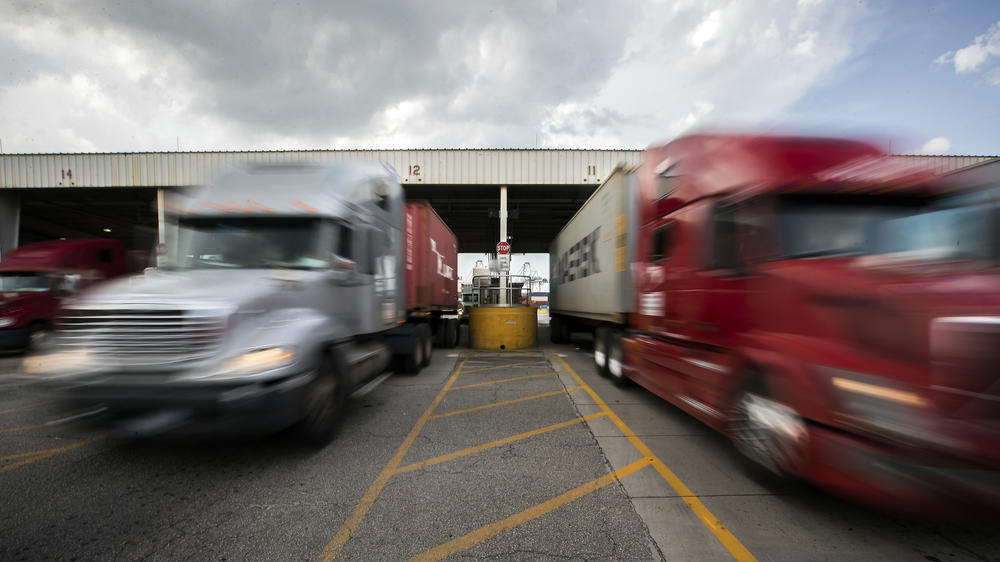 Tractor-trailer trucks use the main gate at the Georgia Ports Authority's Garden City Terminal near Savannah, Ga.