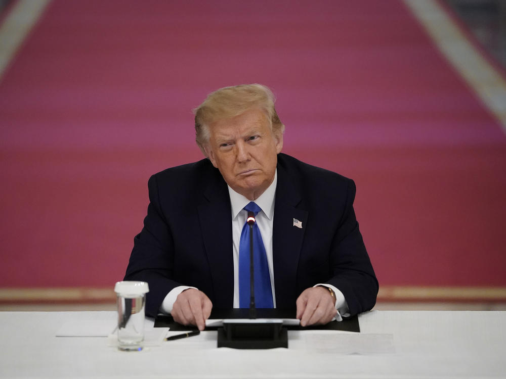 President Trump attends an event about law enforcement on Monday at the White House. Trump has repeatedly downplayed the disproportionate impact of police violence on African Americans.