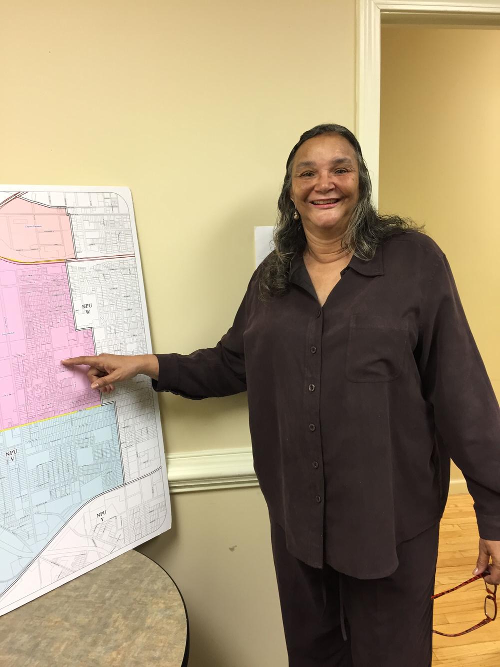 Summerhill resident Gladys Freeman points to her home on a map of downtown Atlanta's NPU-V where Turner Field will be redeveloped. 