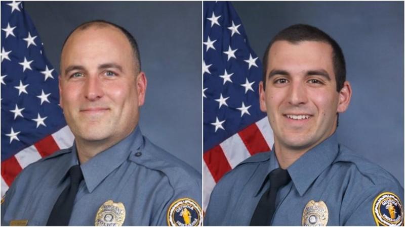 Former Gwinnett County Police Department officers Michael Bongiovanni (left) and Robert McDonald face felony and misdemeanor charges for punching and kicking a man during a traffic stop. 