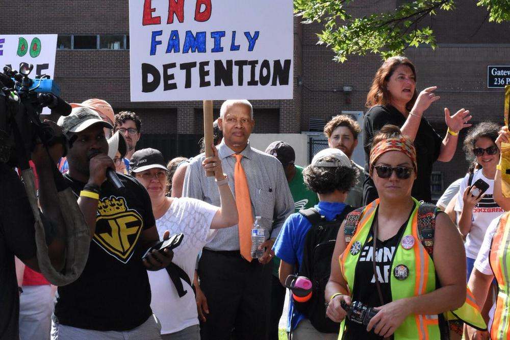 Rep. Hank Johnson joins the crowd during the Atlanta Families Belong Together march Saturday June 30. 