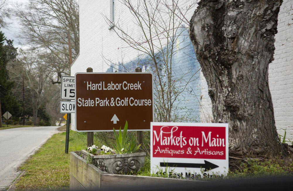 The sign pointing to Hard Labor Creek State Park from downtown Rutledge, about 1/2 mile away from the isolation site for COVID-19 patients.