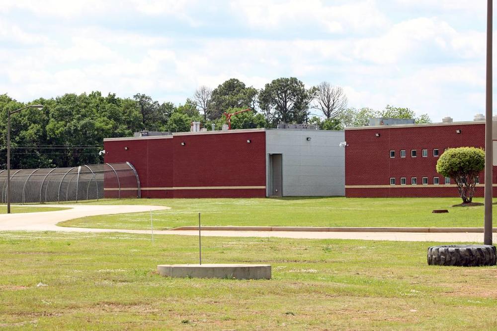 Cell block windows and an exercise yard at the Houston County Detention Center in Perry, where Adrian Saucedo-Luviano and hundreds of other people have been held for ICE.