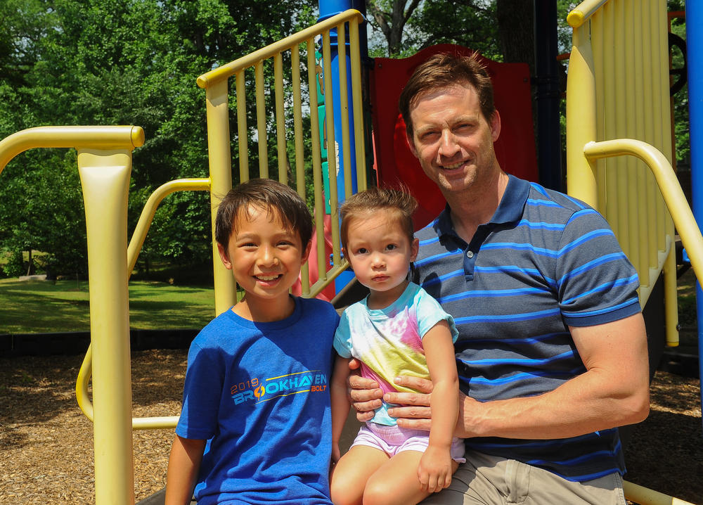 Anthropology professor James Rilling pictured with his son, Toby and daughter, Mia.