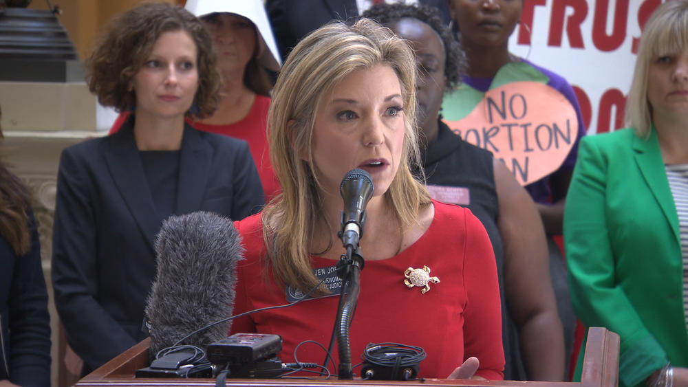 State Senator Jen Jordan (D-6) speaks at the State Capitol during a press conference speaking out against H.B. 481.