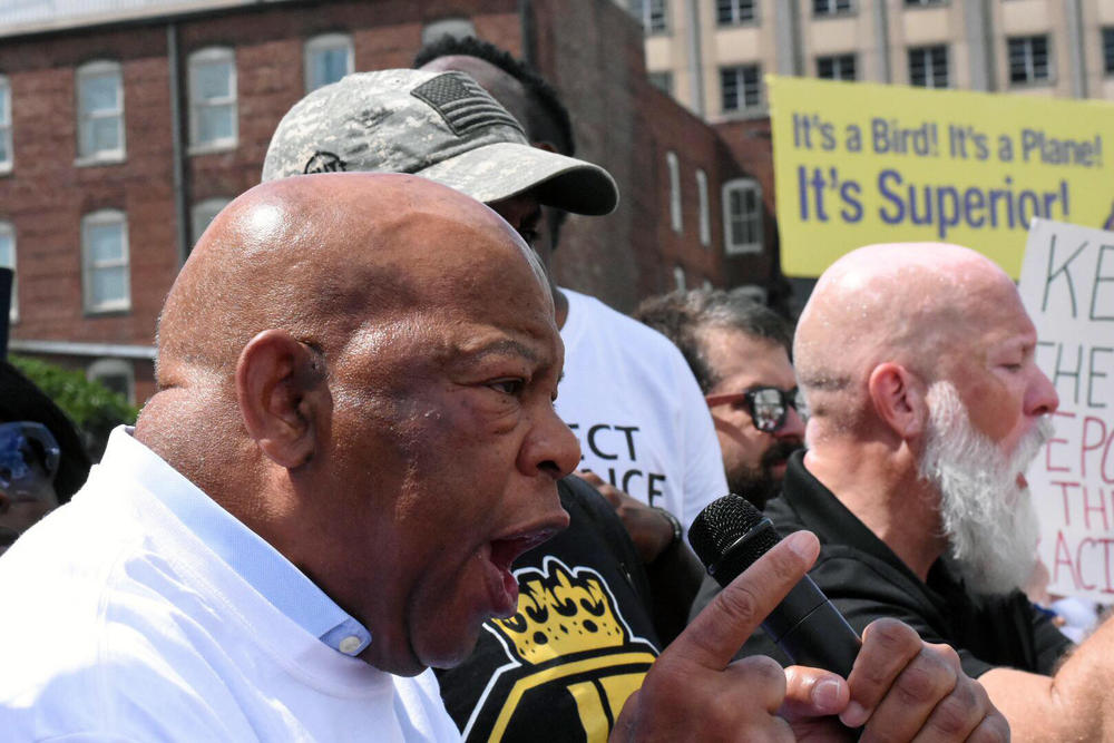 U.S. House Representative John Lewis (D-Atlanta) speaks before a large crowd in Downtown Atlanta during the June 30, 2018 Families Belong Together March