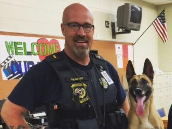 Former Cherokee County School police officer Lt. Dan Peabody and his police K-9 named Inka, who died from heat exhaustion after being left inside a police cruiser.