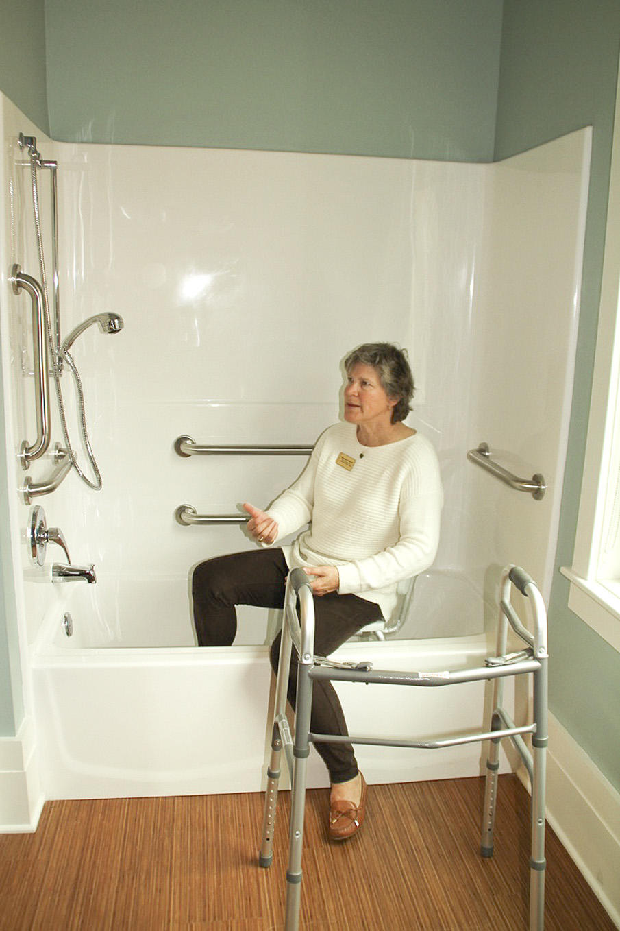 Instructor Kathleen Schaefer teaches caregivers how to assists loved ones in and out of the bathtub.