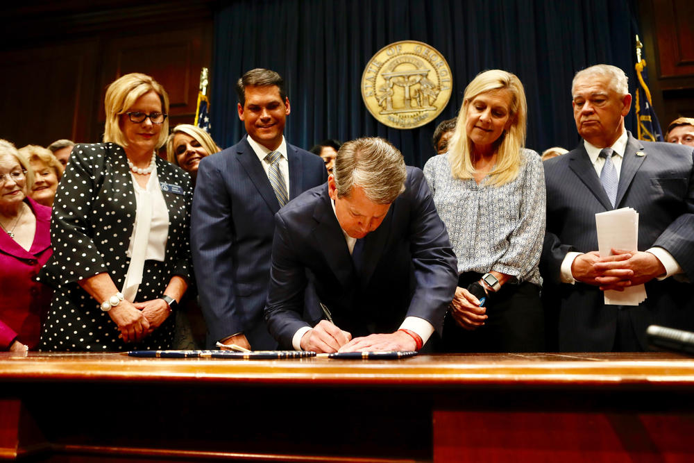 Gov. Brian Kemp signed HB 481 Tuesday May 7, 2019, at the state Capitol.