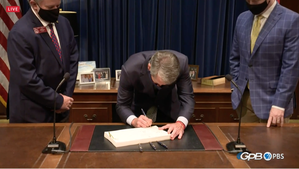 Gov. Brian Kemp signs the FY21 budget.