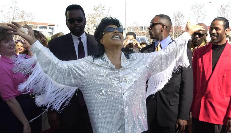 Little Richard greets crowd of well wishers at the historic Douglass Theatre  while in town in 2001 to receive an award.