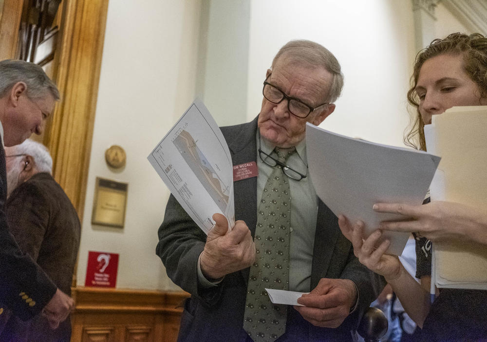 Amber Joyner (R) talks with Tom McCall (R-Elberton) during a lobbying day at the Capitol by the people of Juliette in Monroe County. 