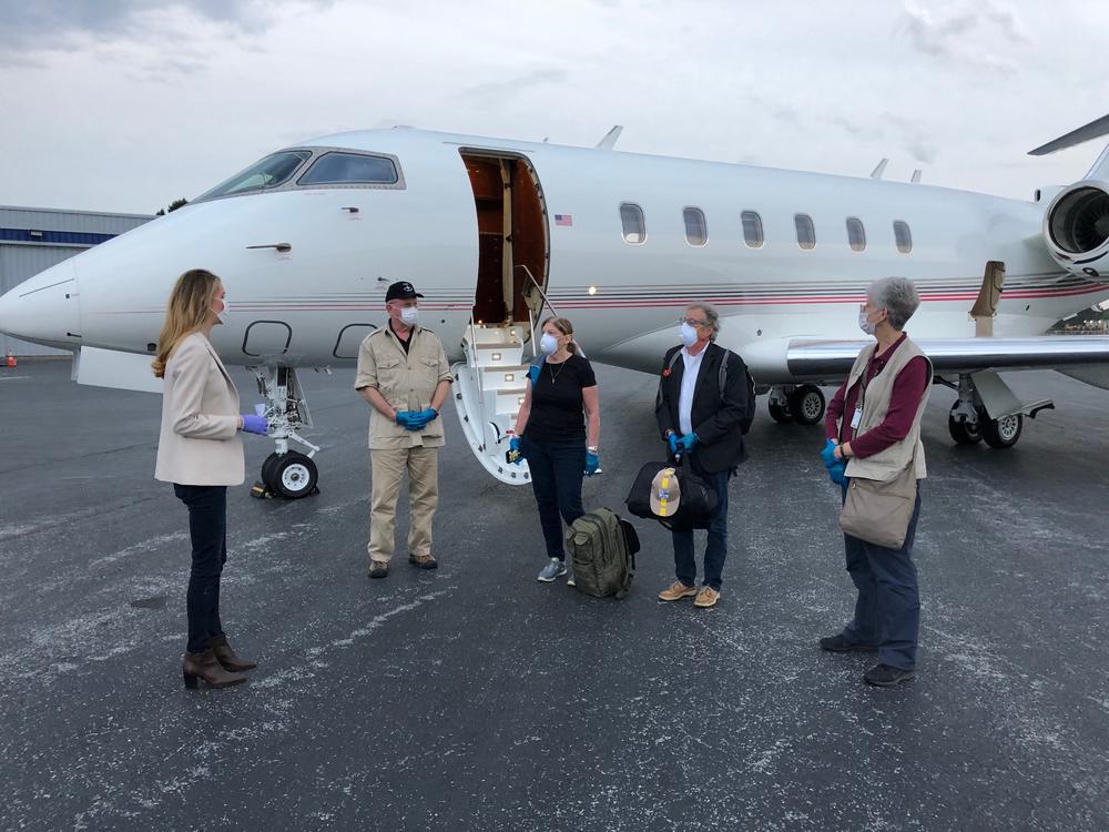 Sen. Kelly Loeffler greets four Georgians that were stranded on a cruise ship off the coast of Florida because of coronavirus.