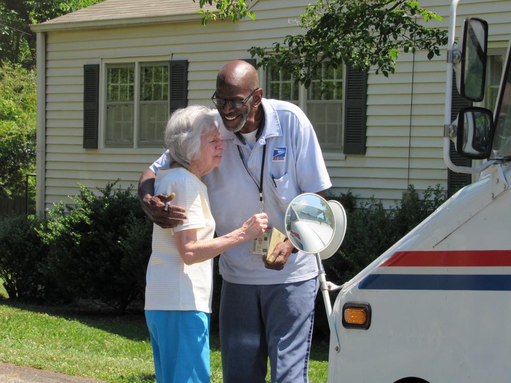 Beloved Mailman Floyd Martin was celebrated on his last day by customers on his route.