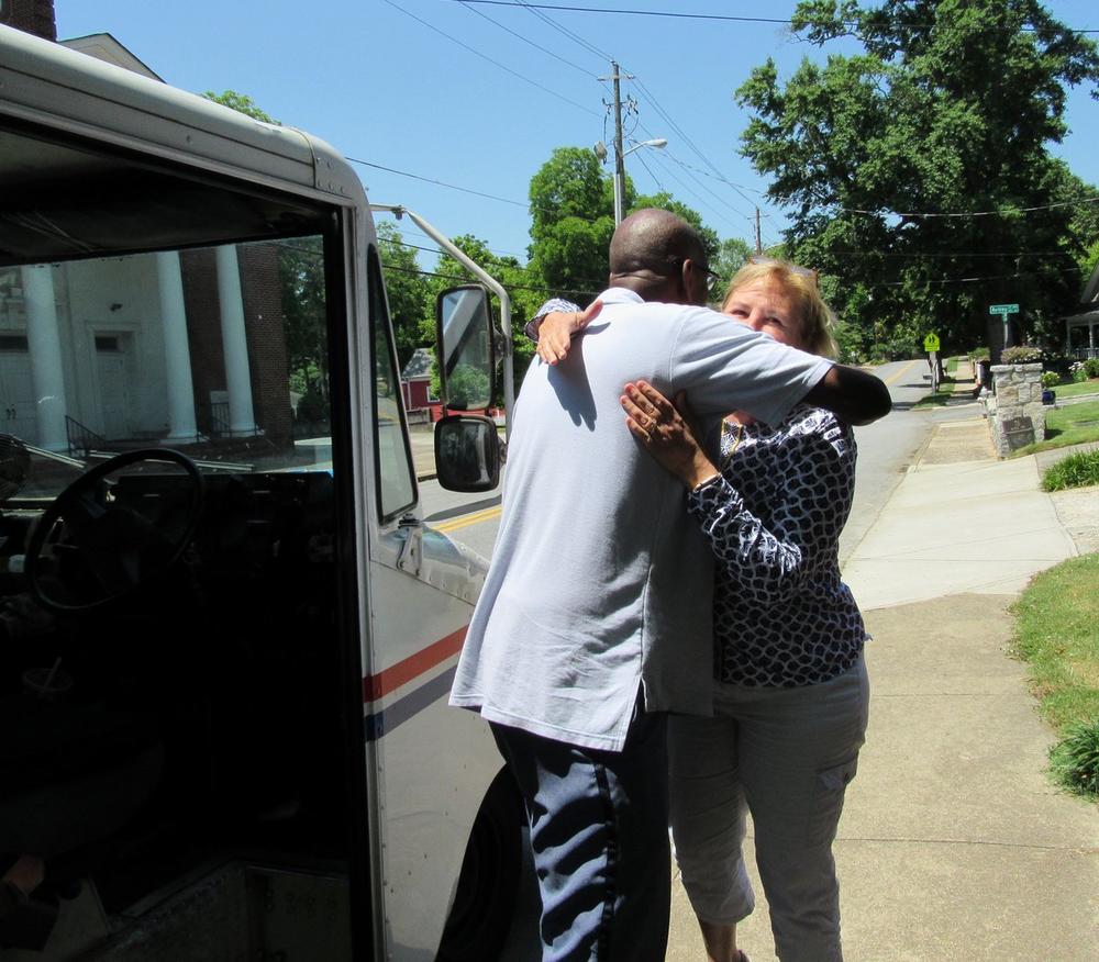 Beloved Mailman Floyd Martin was celebrated on his last day by customers on his route.