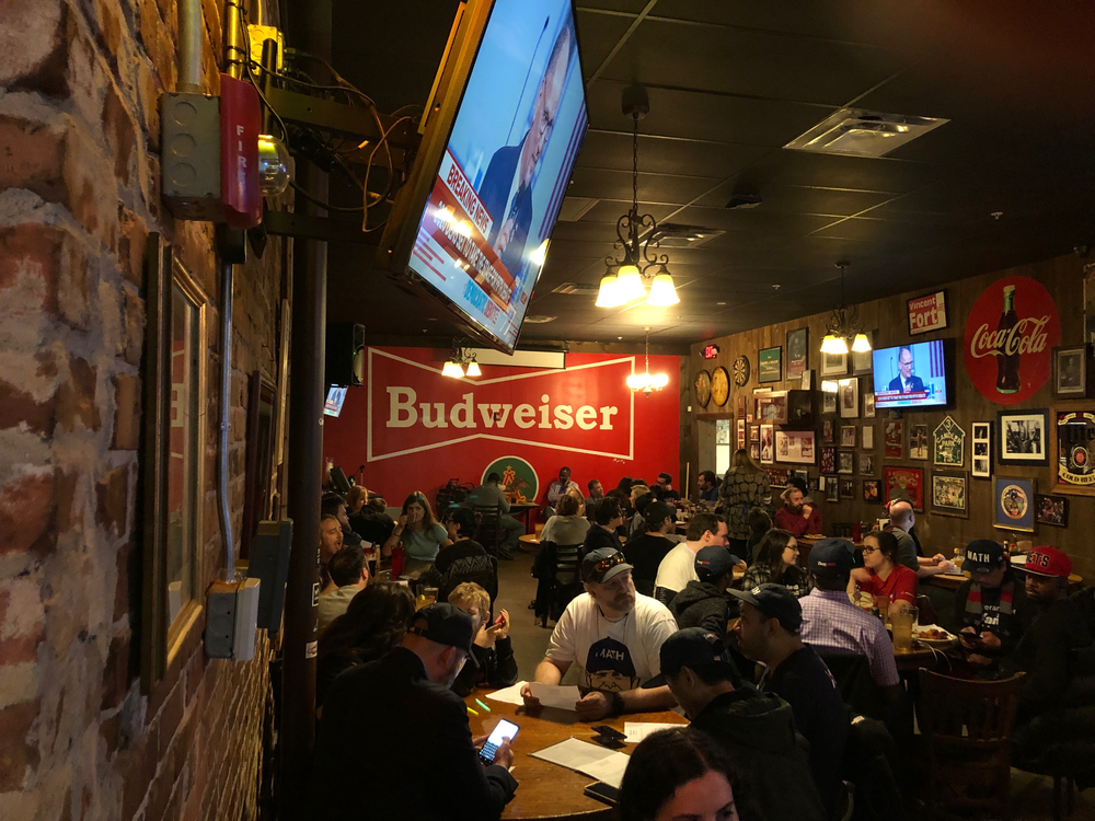 People gather at Manuel's Tavern in Atlanta to watch the debates Nov. 20, 2019. 