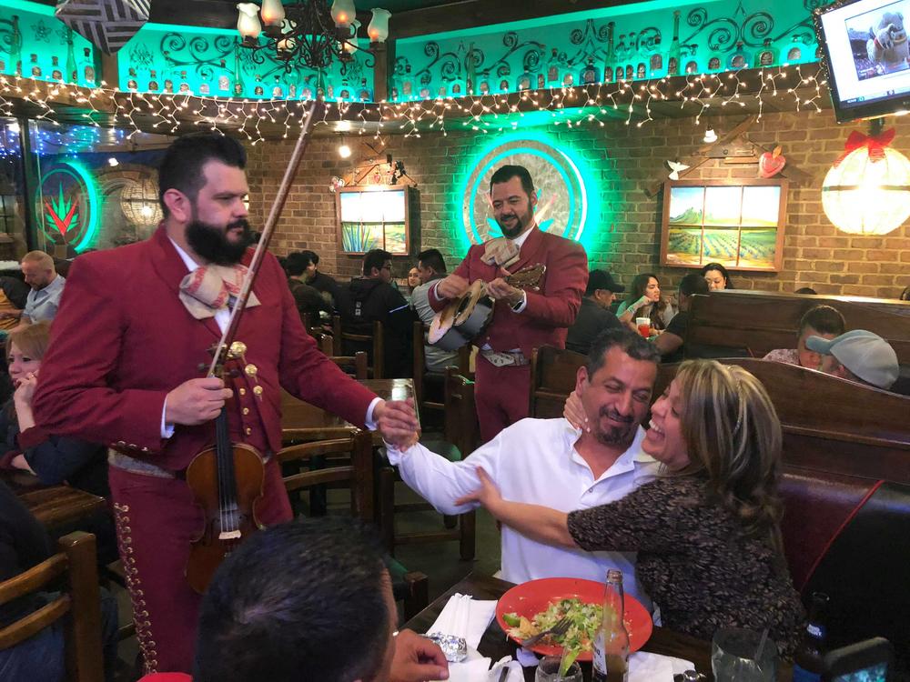 Humberto Perez (l) and Luis Vazquez (r) perform at Agavero Cantina in Lilburn, Georgia.