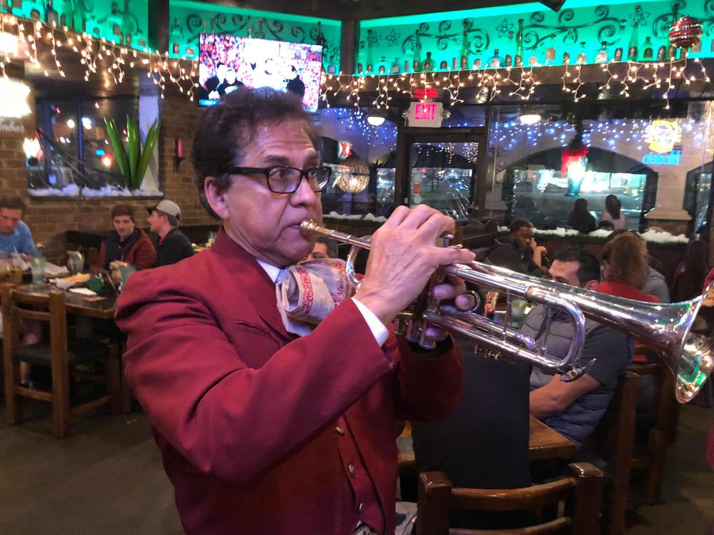 Octavio Garcia plays trumpet at Agavero Cantina in Lilburn, Georgia.