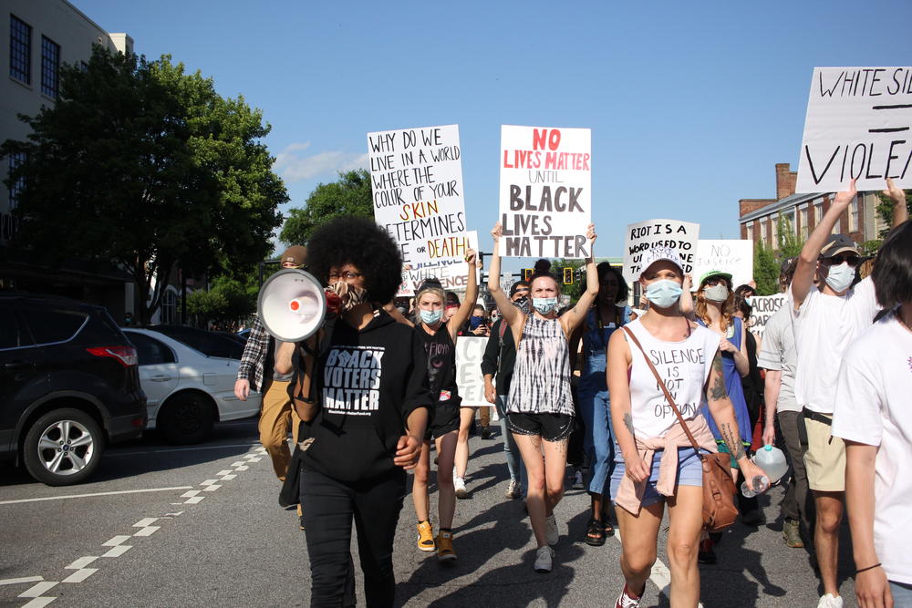 Athens-Clarke County District 2 Commissioner Mariah Parker leads a march in downtown Athens, Georgia, on Sunday, May 31. Parker tested positive for COVID-19 on Wednesday and encouraged fellow protesters to get tested. 