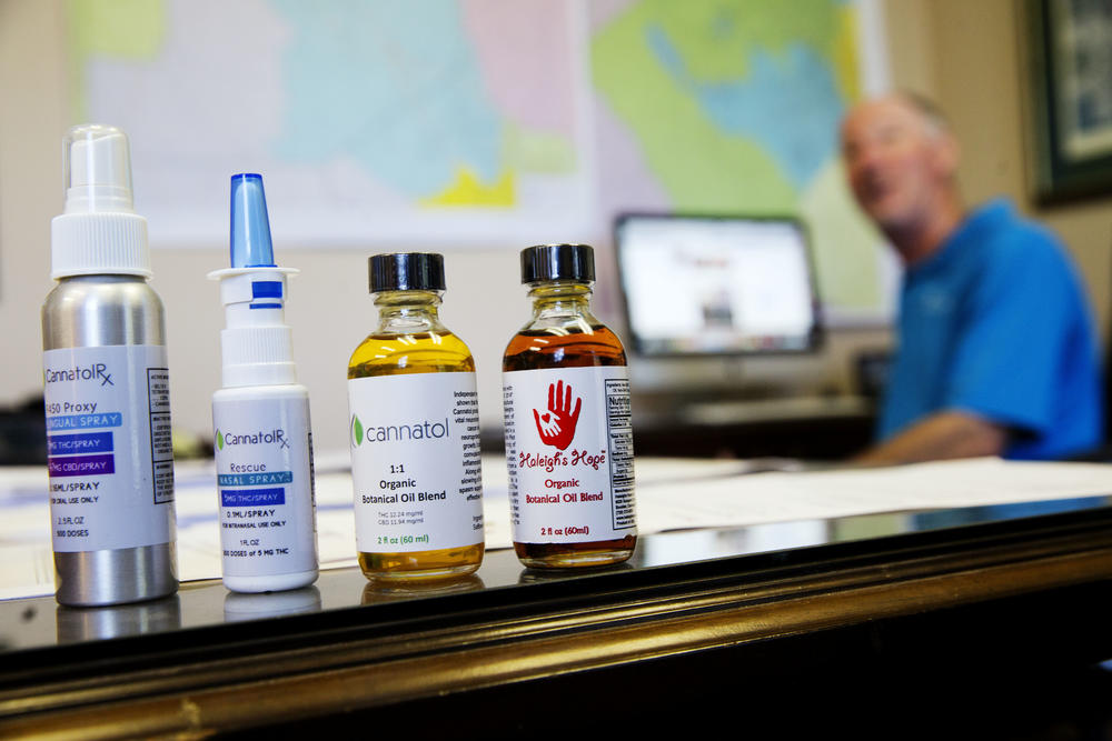 In this Monday, April 17, 2017 photo, various cannabis oil products are displayed in the office of Georgia State Rep. Allen Peake in Macon, Ga.