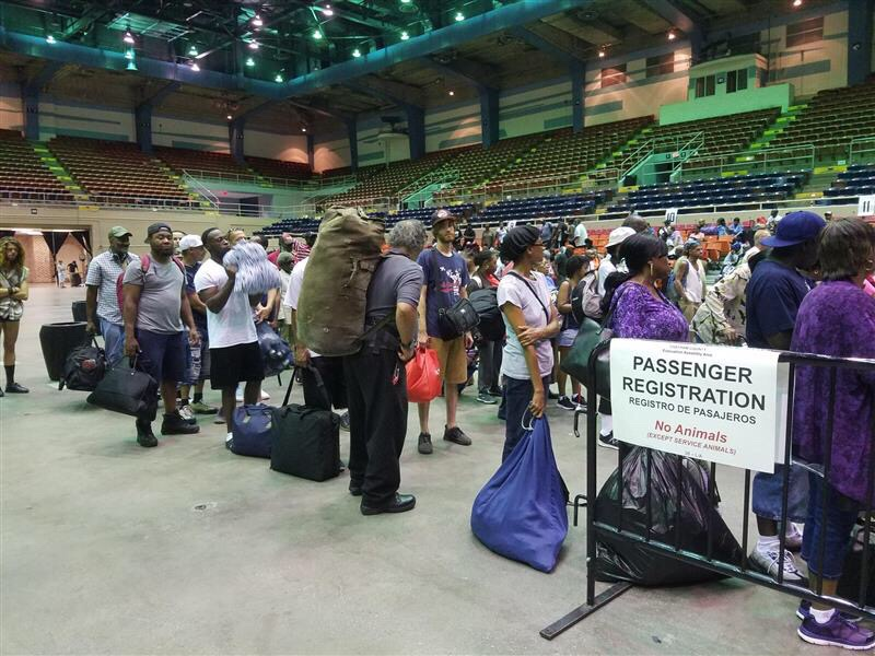 Evacuees wait to leave the Savannah Civic Center in advance of Hurricane Dorian.