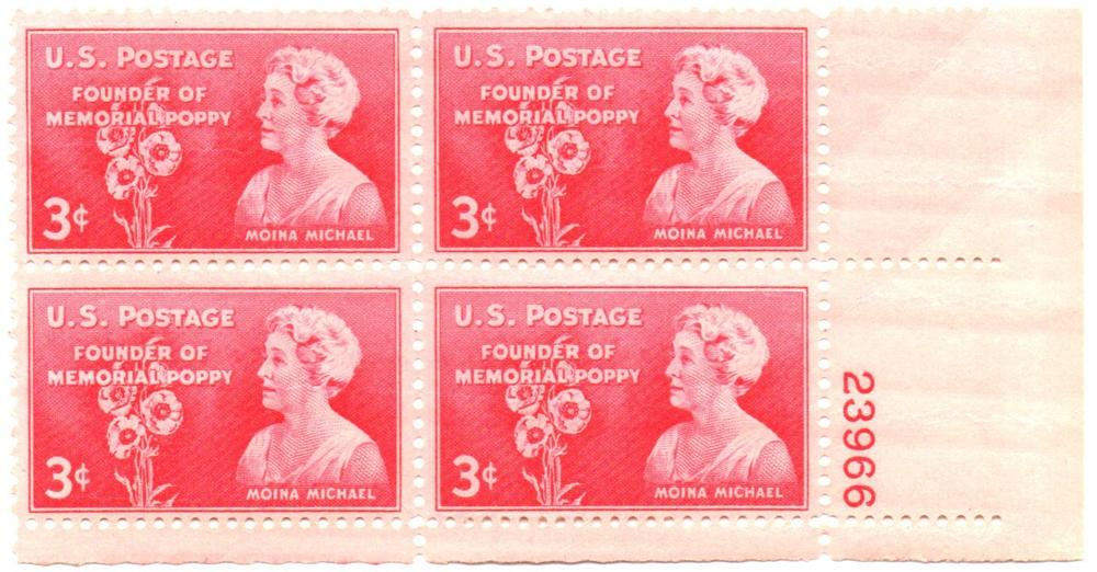 A commemorative stamp featuring Moina Michael, who brought the red poppy to the spotlight as a symbol of remembrance for those who died during war.