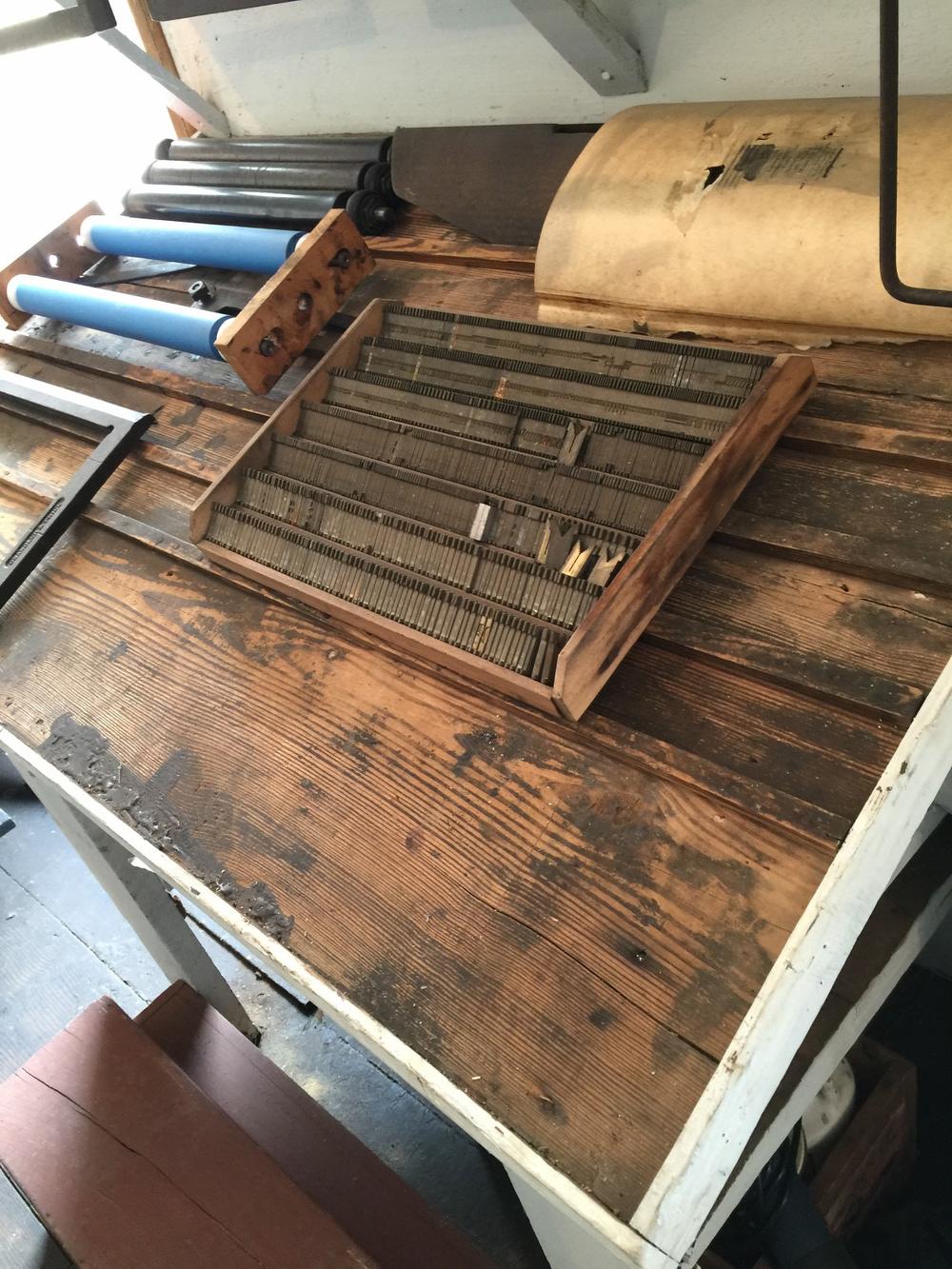 Before the rise of offset printing in the mid 20th century, print shops composed newspapers by hand. Capital letters were kept in the upper cases, while small letters were stored below. Hence the terms 