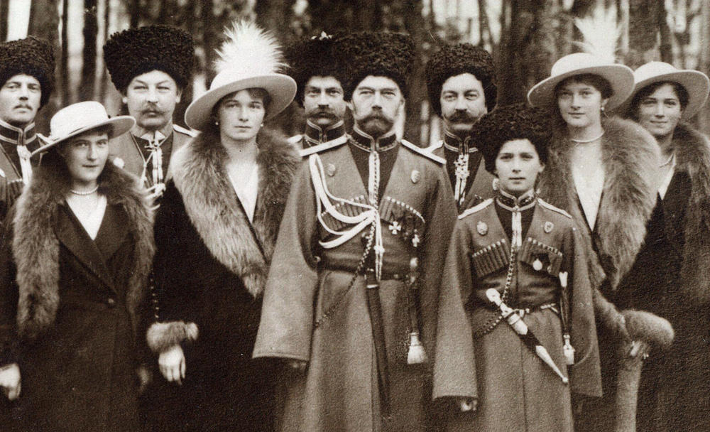 The Romanovs visiting a regiment during World War I. From left to right, Grand Duchess Anastasia, Grand Duchess Olga, Tsar Nicholas II, Tsarevich Alexei, Grand Duchess Tatiana, and Grand Duchess Maria, and Kuban Cossacks circa 1916.