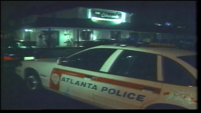 A screenshot from video of Atlanta police responding to a 1997 bombing at the Otherside Lounge.